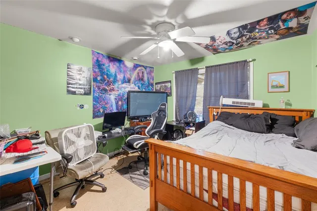 a bedroom with furniture and a bed