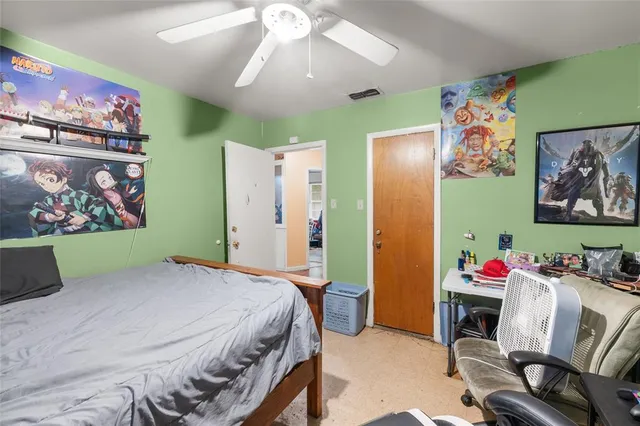 a room with gym equipment and a large window