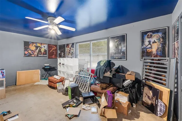 a room with furniture and gym equipment