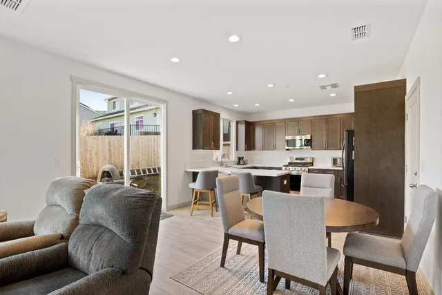 a view of a dining room with furniture