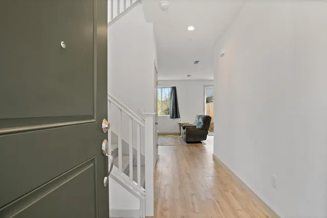 a view of a livingroom with wooden floor
