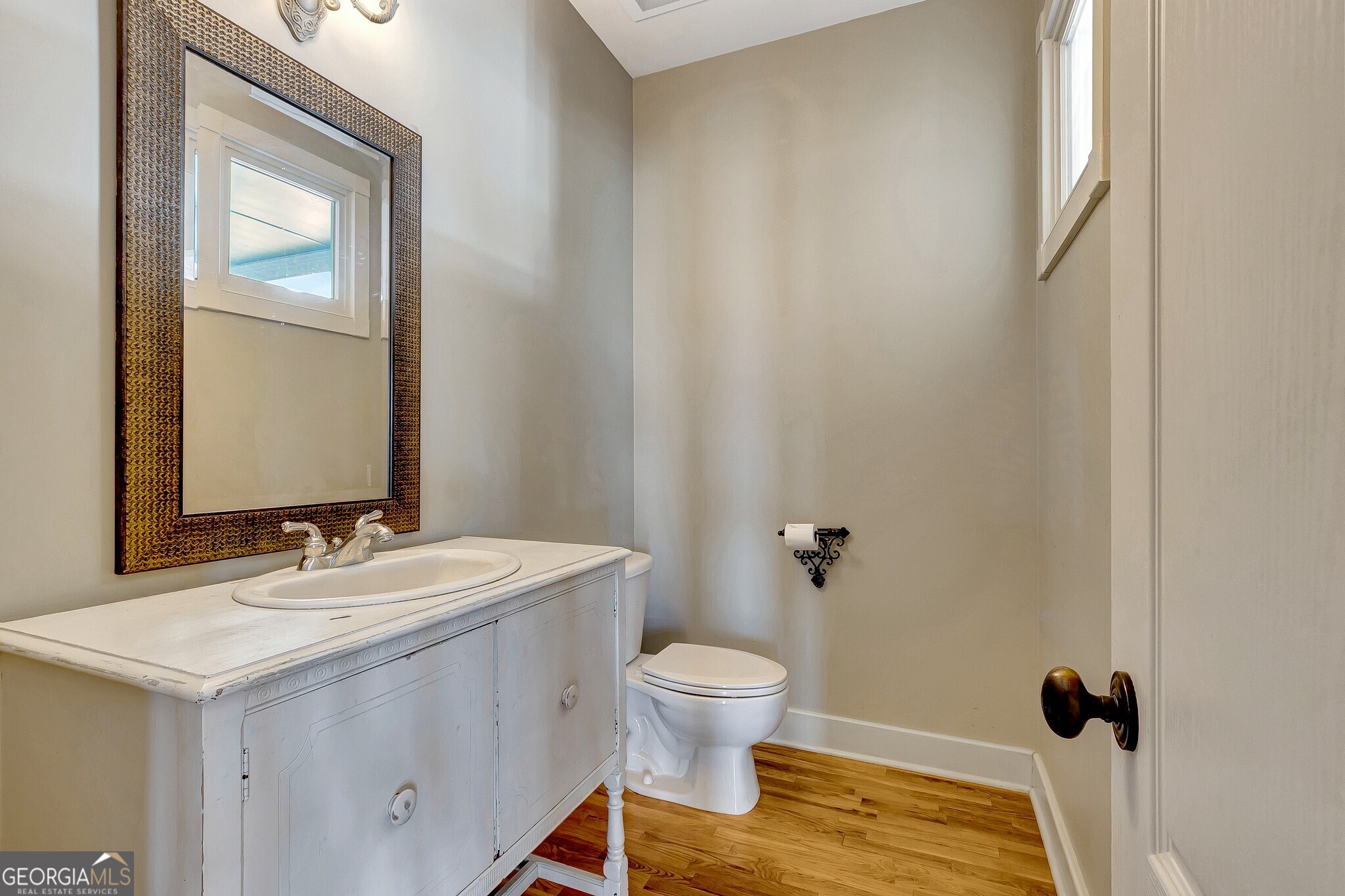 220 Joe Roberts Road Newnan, GA 30263 - Photo 18 of 108 a bathroom with a sink toilet and vanity