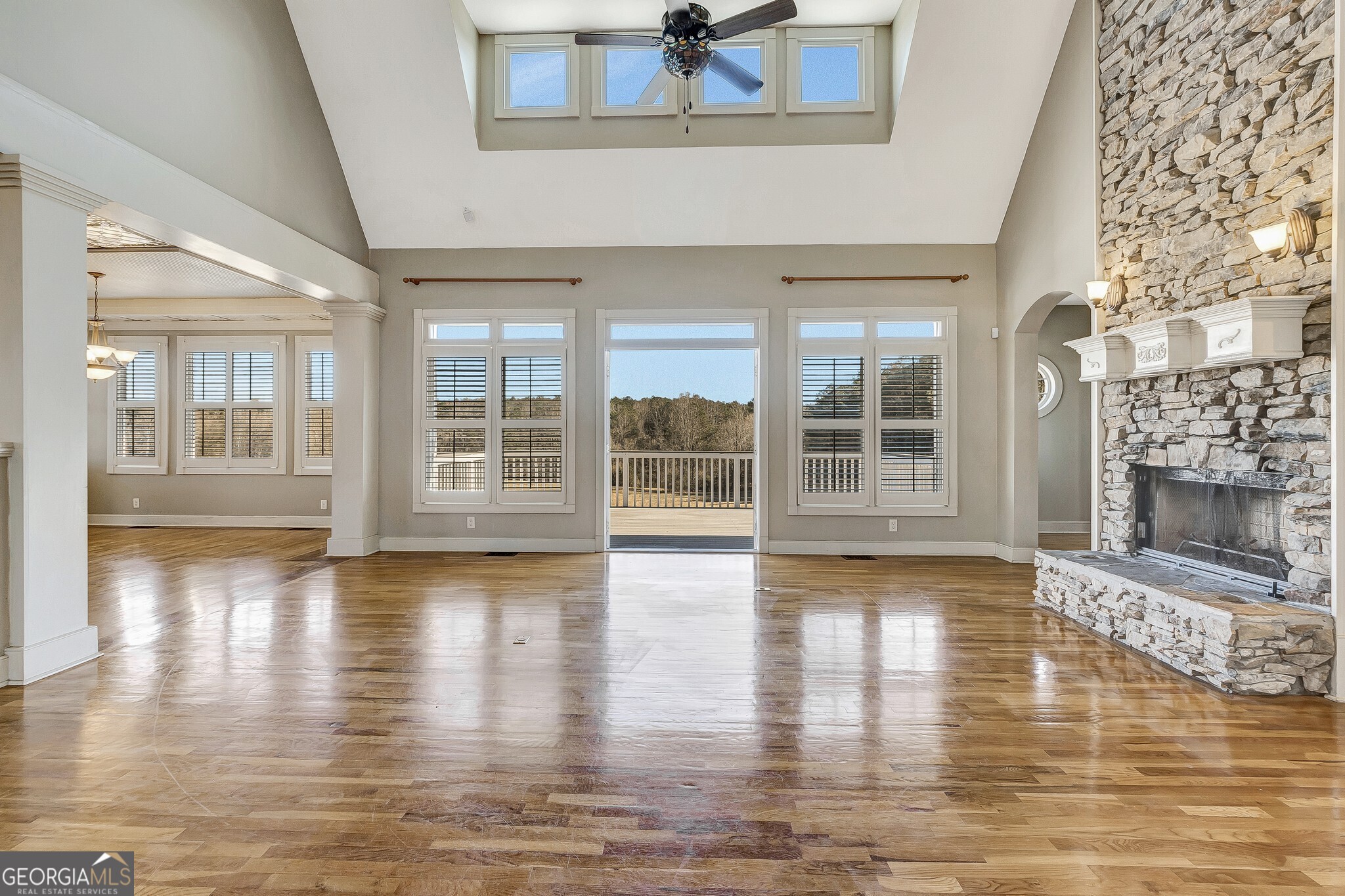 220 Joe Roberts Road Newnan, GA 30263 - Photo 19 of 108 a view of an empty room with wooden floor and a window