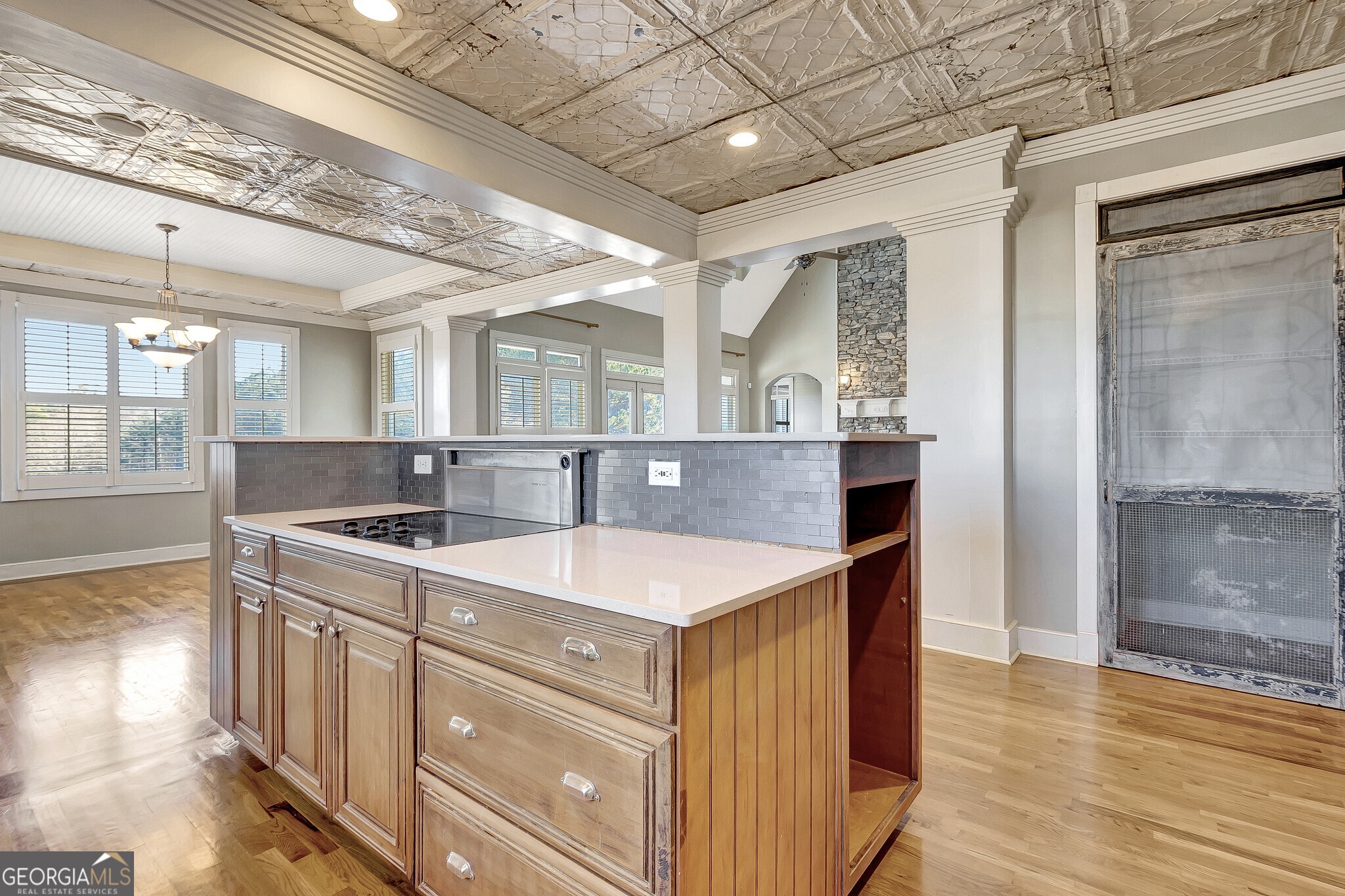 220 Joe Roberts Road Newnan, GA 30263 - Photo 38 of 108 a view of a kitchen counter space a sink and dishwasher with wooden floor