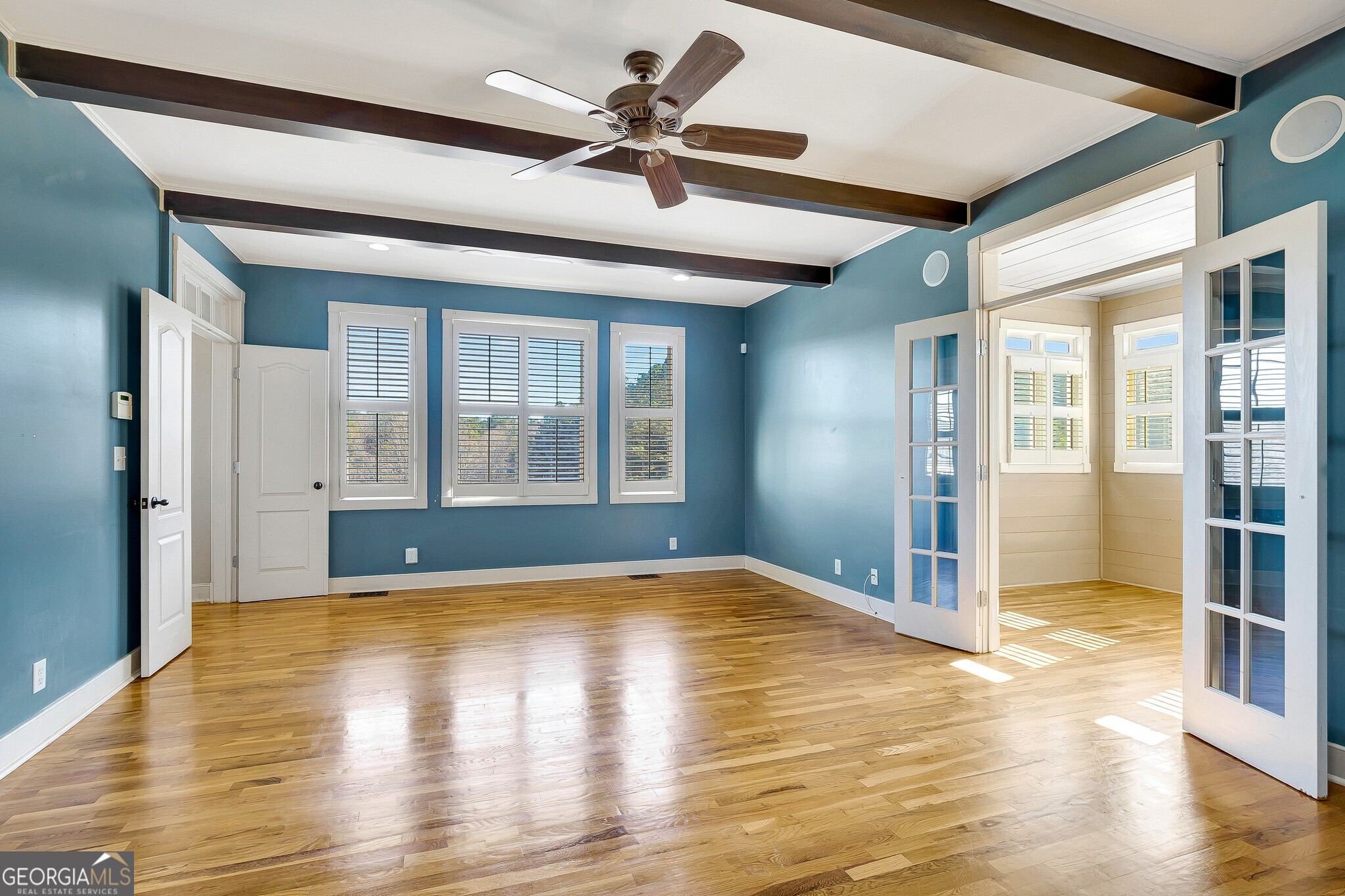 220 Joe Roberts Road Newnan, GA 30263 - Photo 49 of 108 a view of an empty room with window and wooden floor