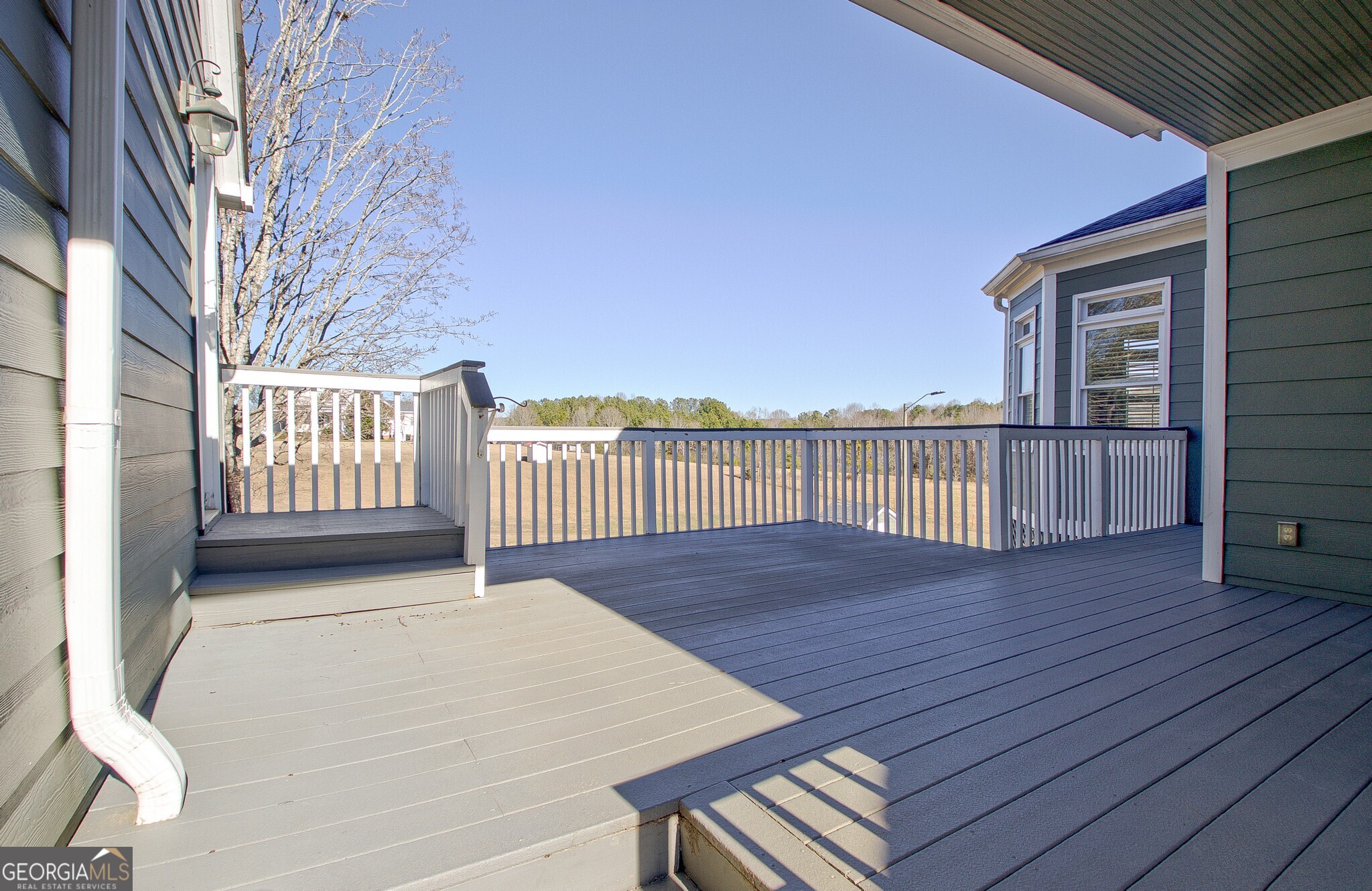 220 Joe Roberts Road Newnan, GA 30263 - Photo 79 of 108 a view of a house with wooden floor next to a building
