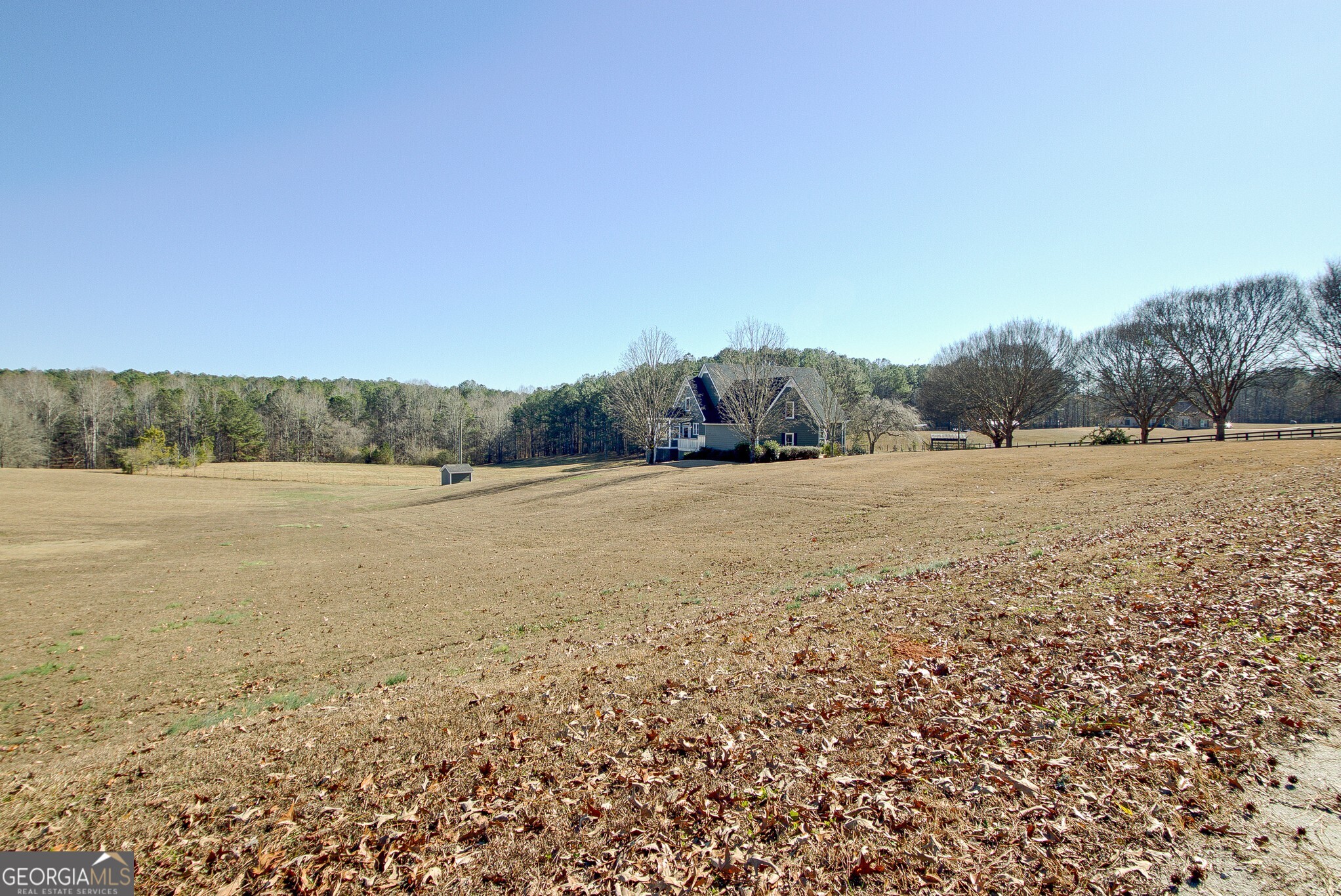 220 Joe Roberts Road Newnan, GA 30263 - Photo 8 of 108 a view of an outdoor space and a yard