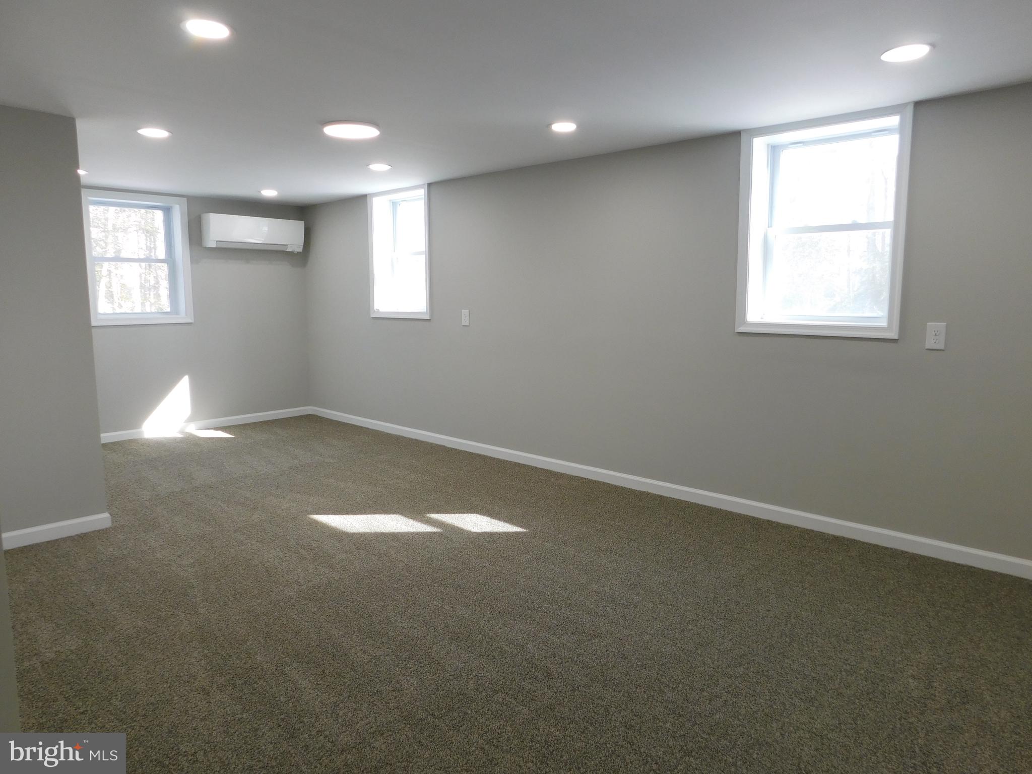 9458 Benson Road Lincoln, DE 19960 - Photo 27 of 38 an empty room with windows