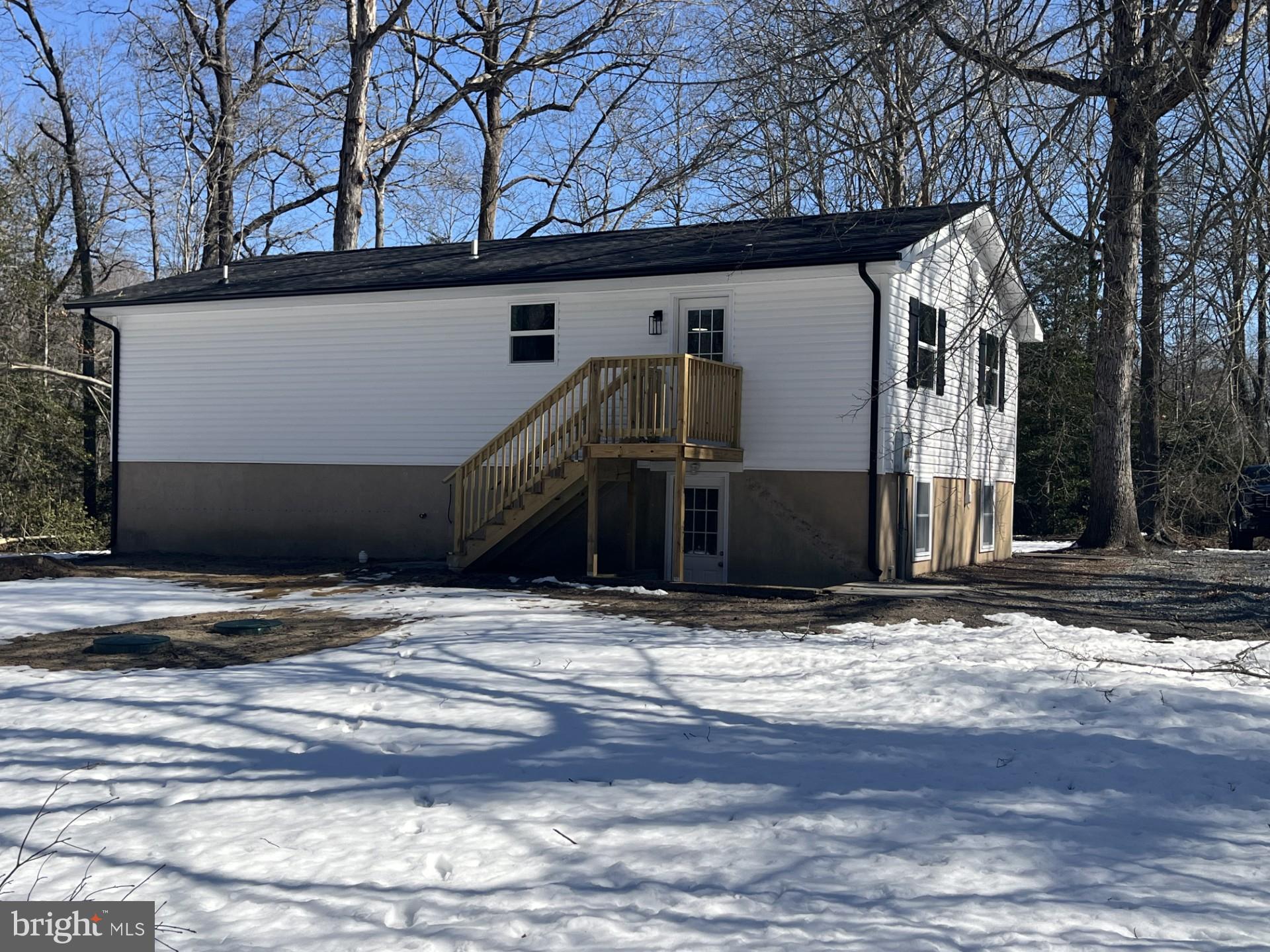 9458 Benson Road Lincoln, DE 19960 - Photo 36 of 38 a view of a house with a snow