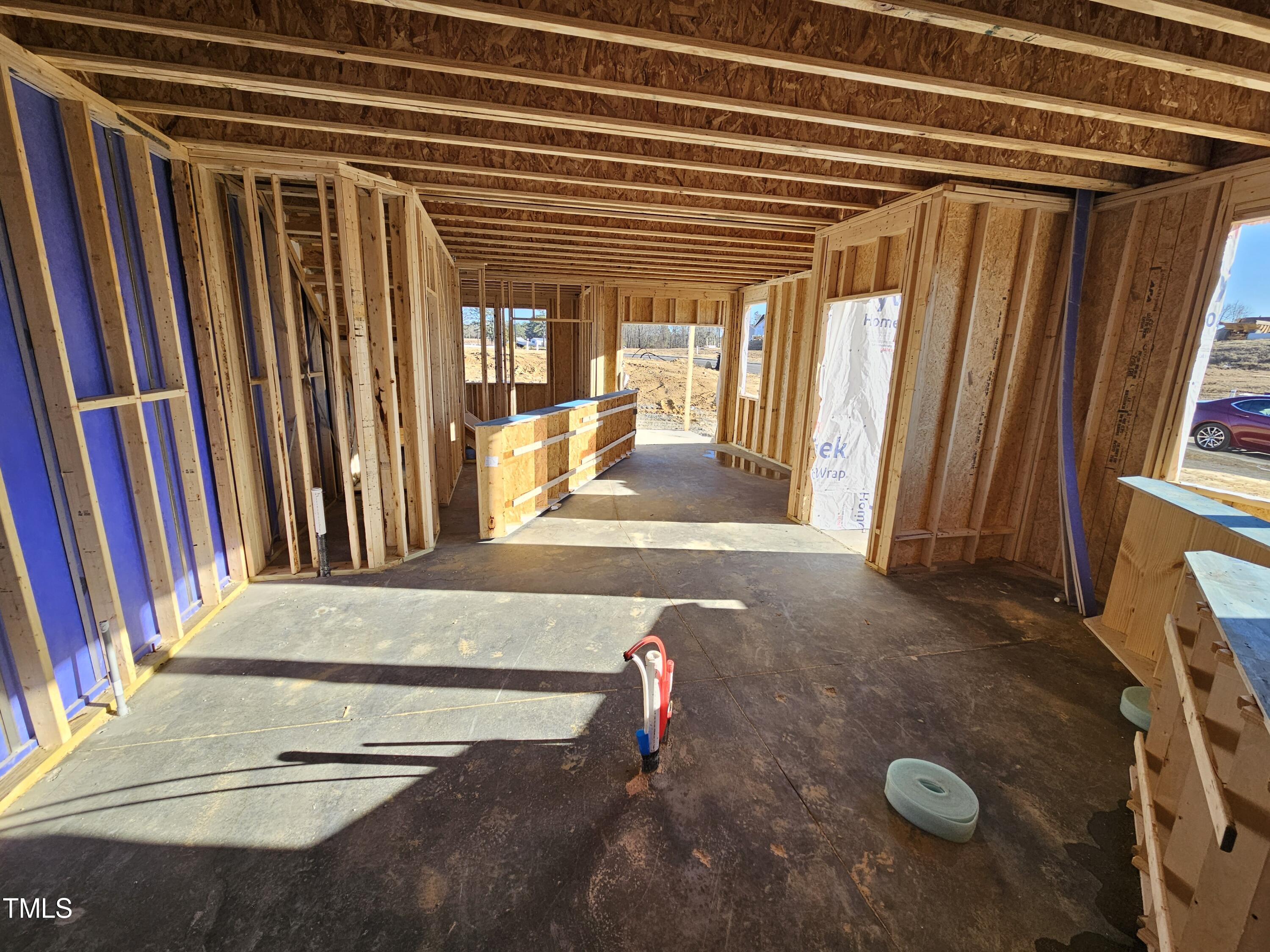 6526 Winter Spring Drive Wake Forest, NC 27587 - Photo 6 of 9 a view of a livingroom with furniture and staircase