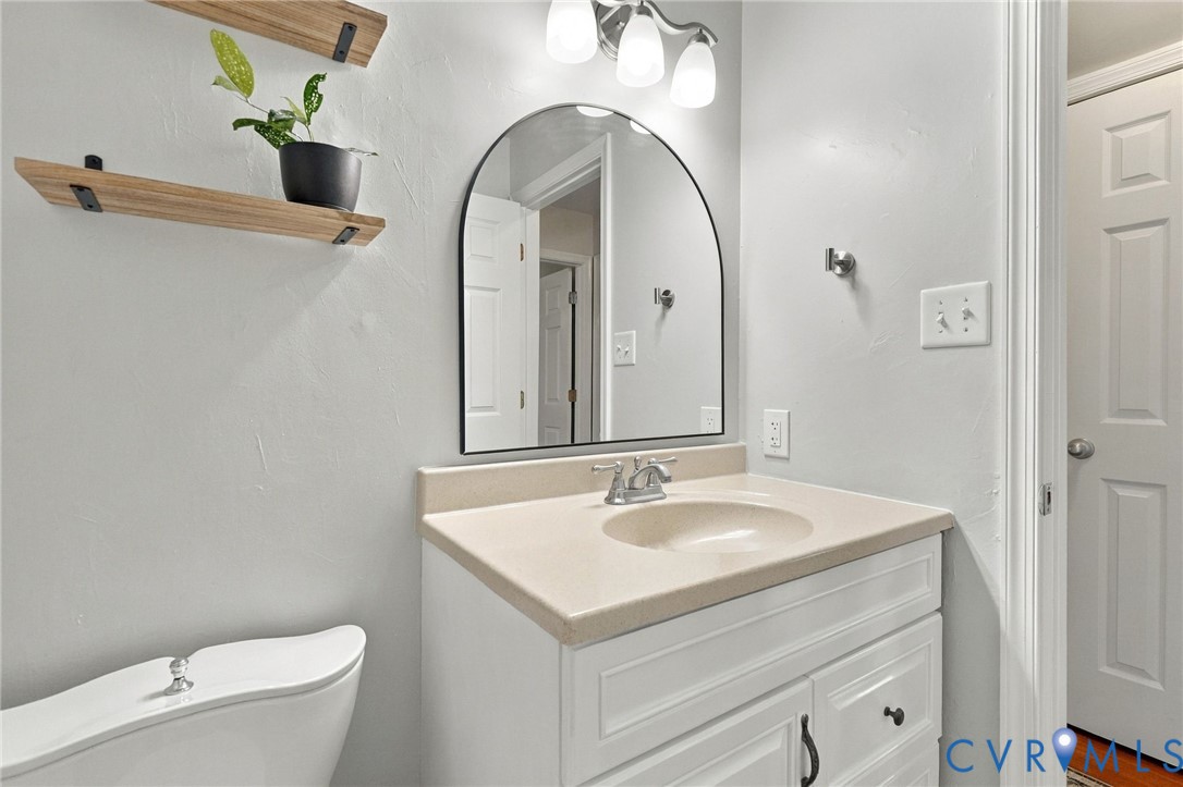 194 Poplar Road Aylett, VA 23009 - Photo 21 of 48 White vanity with an integrated sink and light-ton