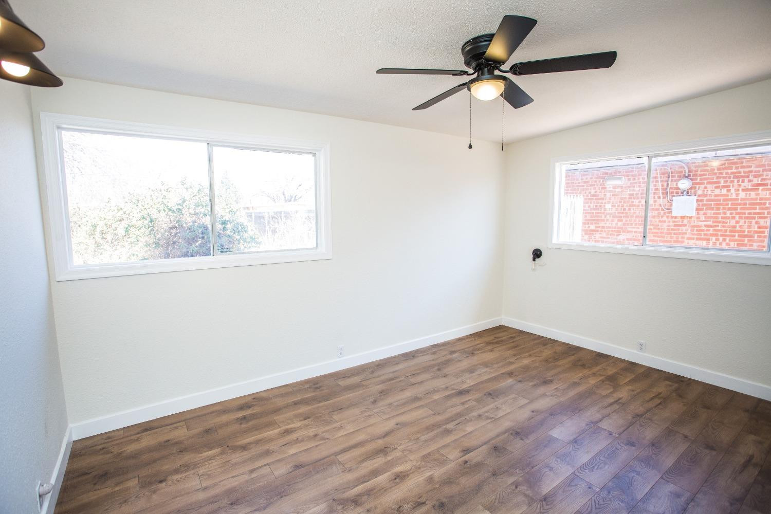 2728 66th Street Lubbock, TX 79413 - Photo 14 of 22 a view of an empty room with a window