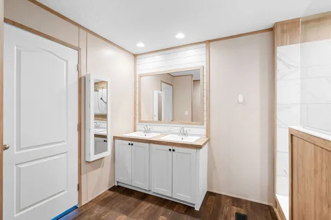 a bathroom with a sink and a mirror