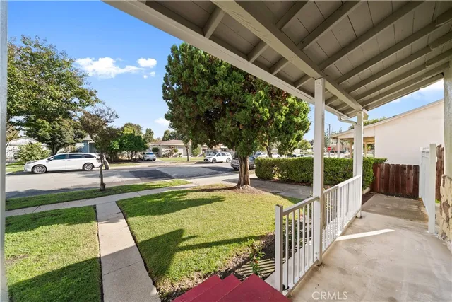 a view of a porch with a big yard