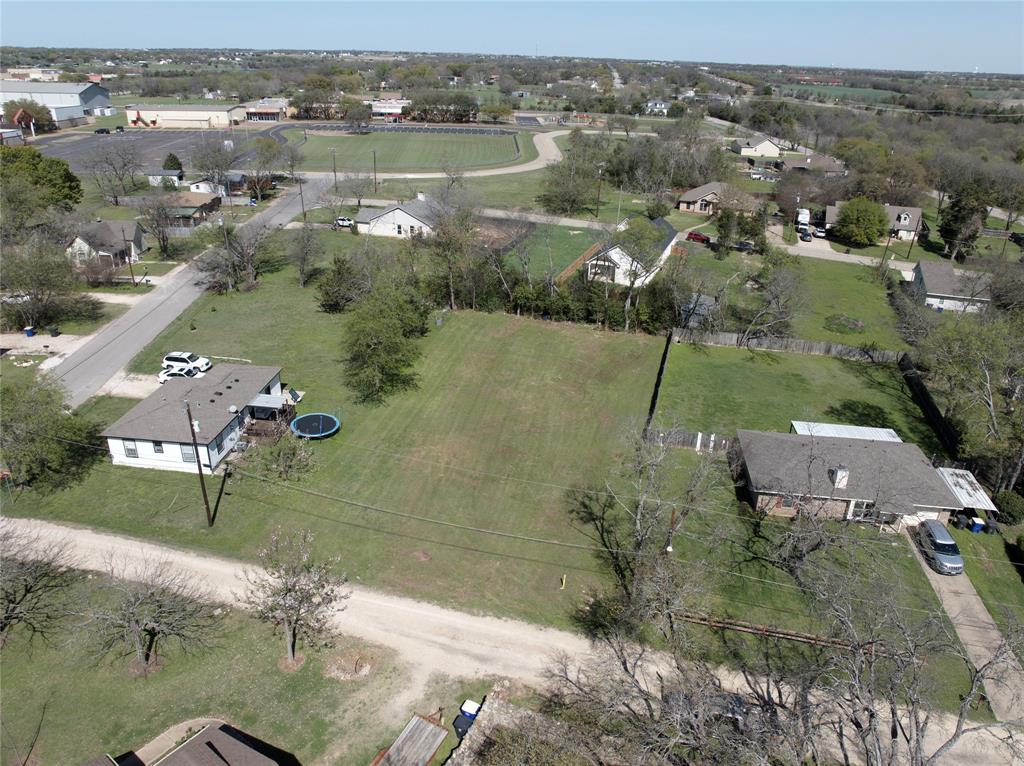 Tbd West Castro Street Lorena, TX 76655 - Photo 1 of 9 an aerial view of residential houses with outdoor space and lake view