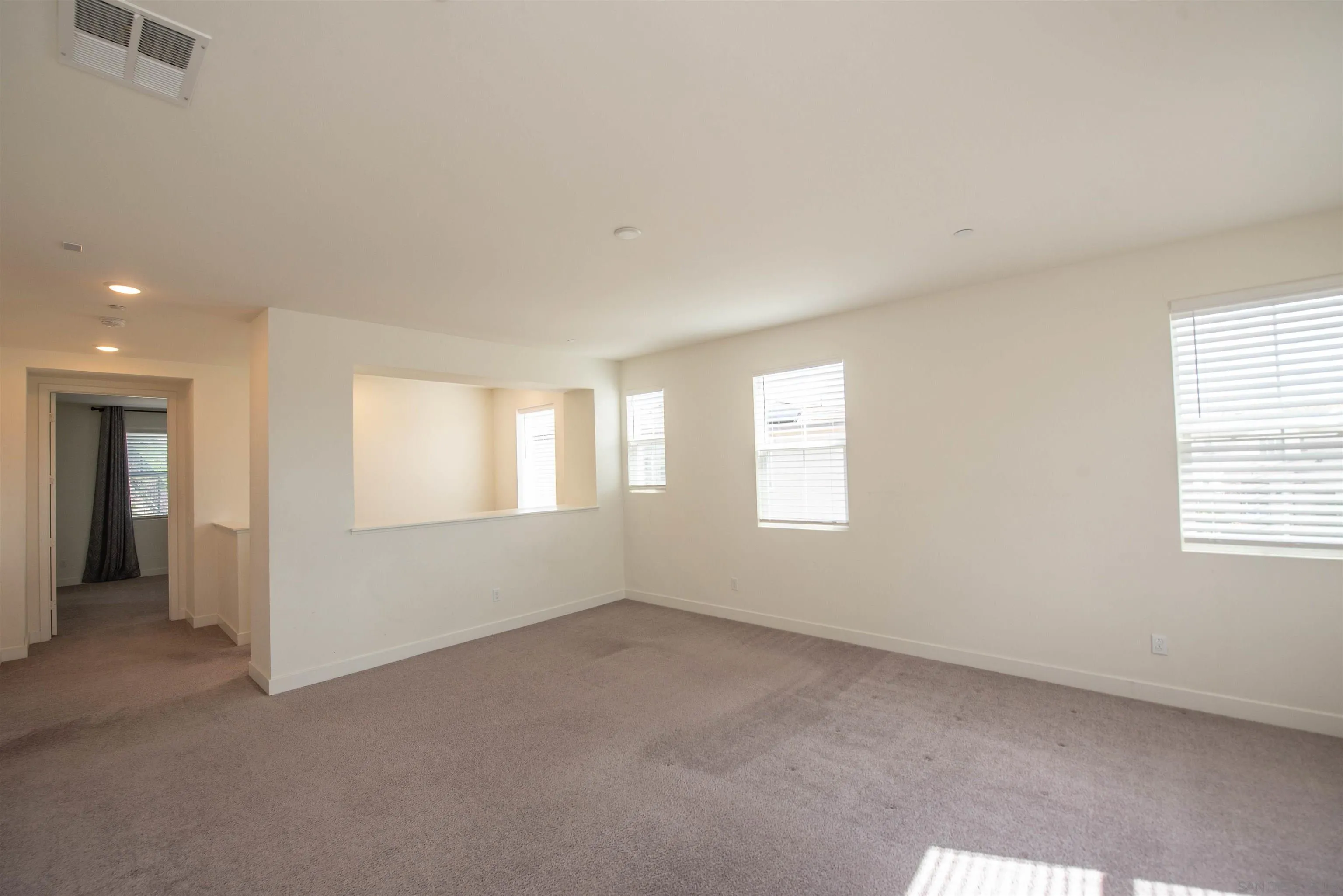 8902 Trailridge Avenue Santee, CA 92071 - Photo 21 of 38 a view of an empty room with a window