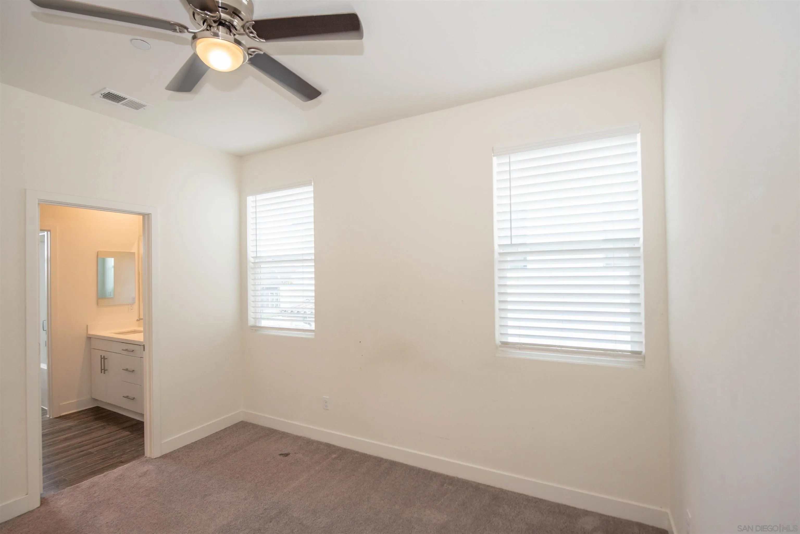 8902 Trailridge Avenue Santee, CA 92071 - Photo 24 of 38 a view of an empty room with a window