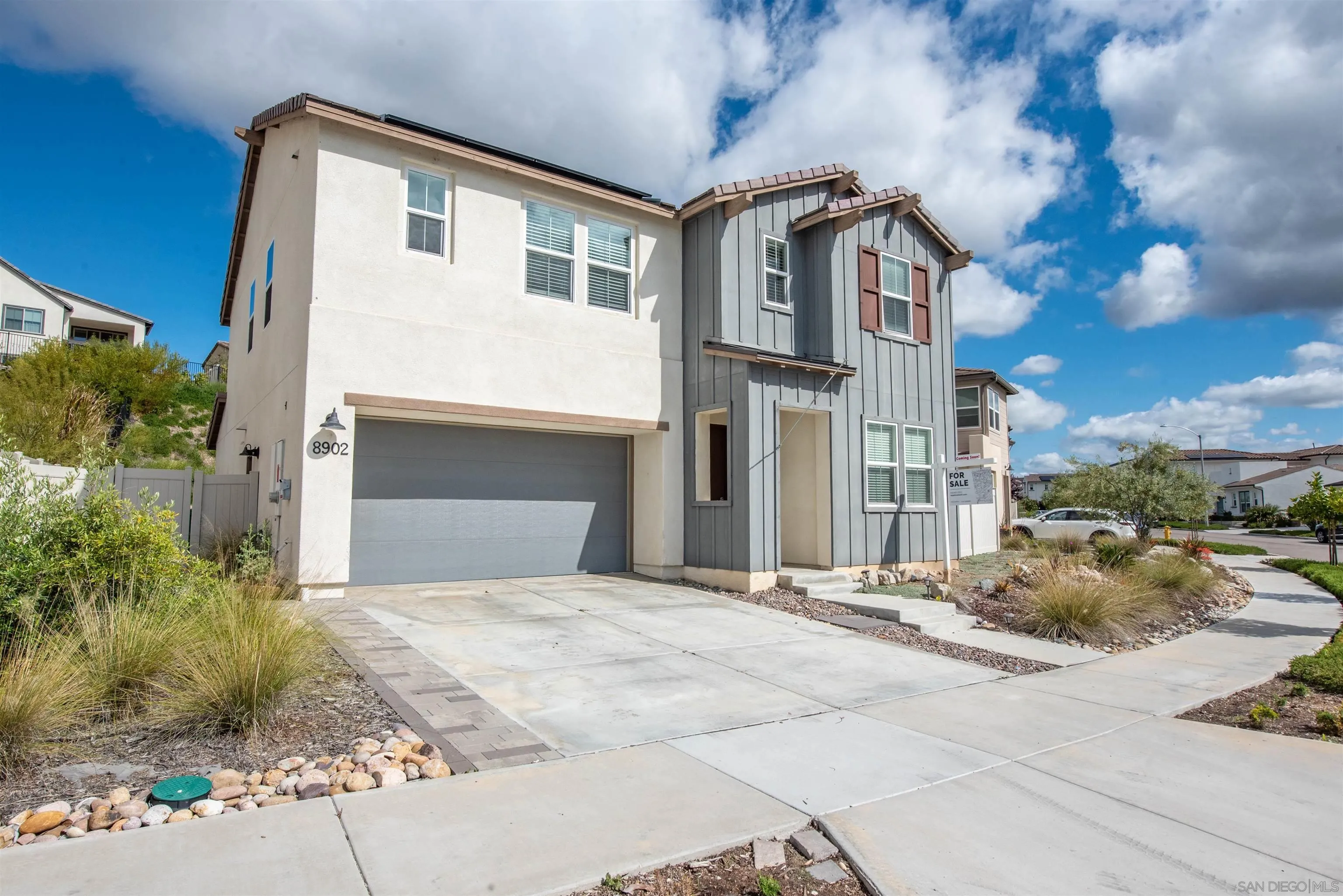 8902 Trailridge Avenue Santee, CA 92071 - Photo 31 of 38 a front view of a house with a yard