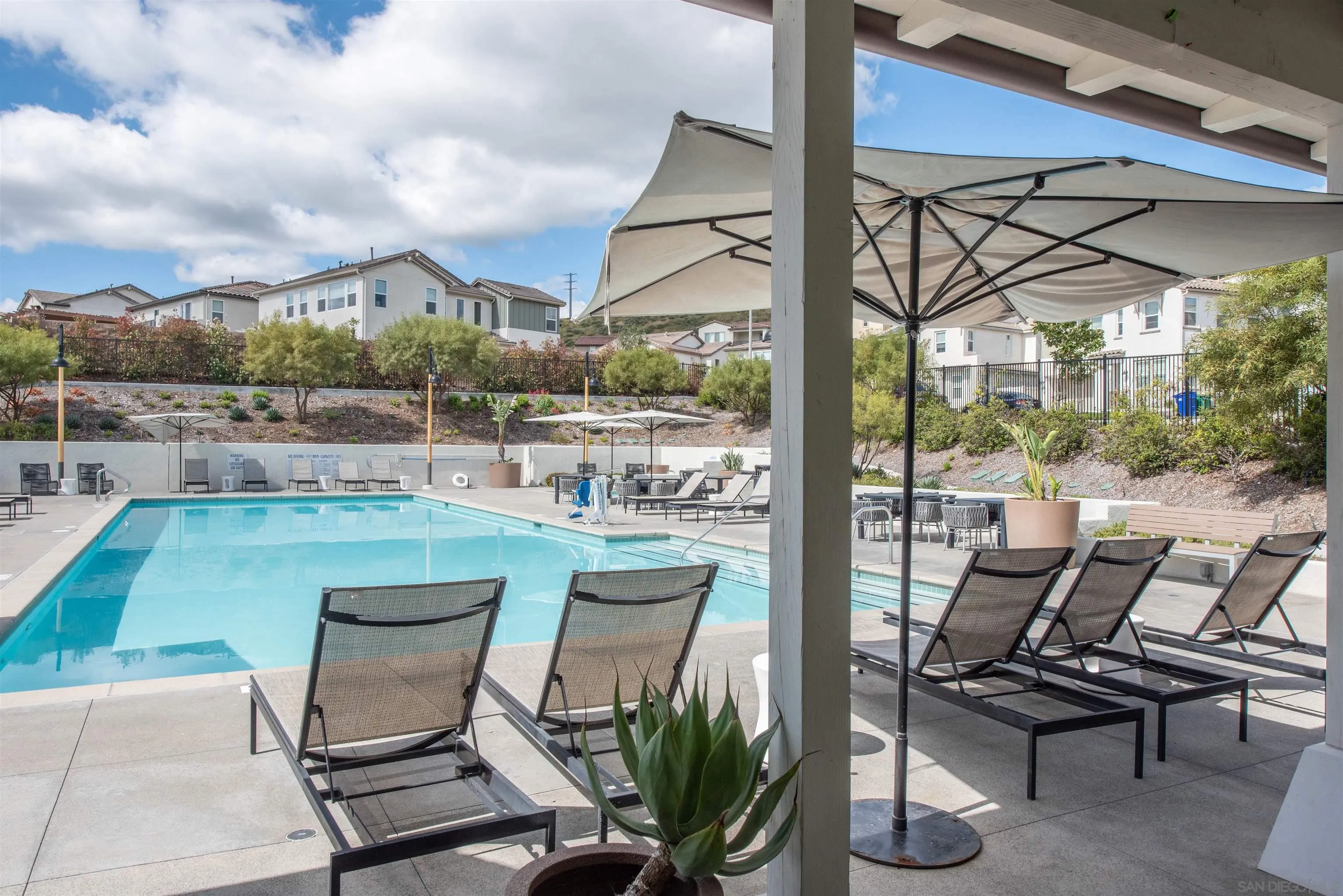 8902 Trailridge Avenue Santee, CA 92071 - Photo 37 of 38 a view of a chairs and table in patio with a fire pit