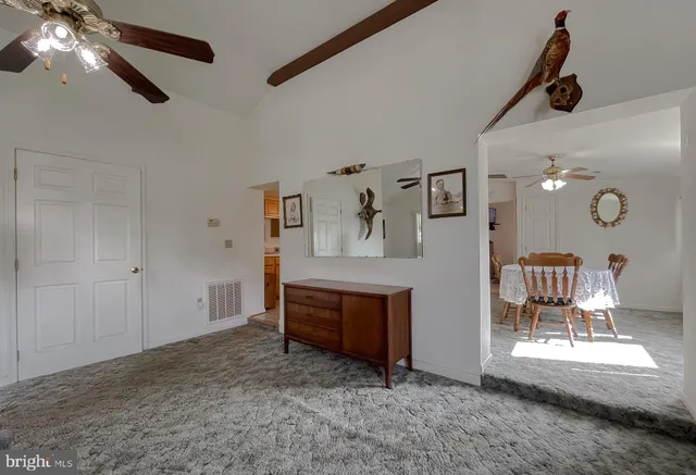 a kitchen with a sink cabinets and window