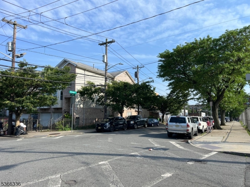 27 Camp Street, Unit 3 Newark, NJ 07102 - Photo 9 of 23 a view of a city street with parked cars