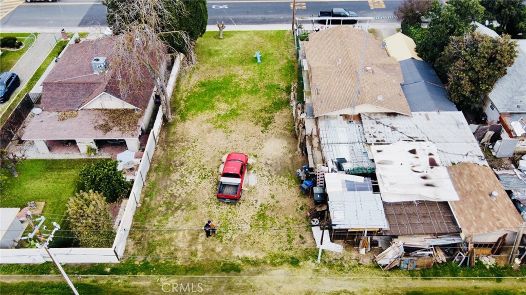 0 Davis Street Livingston, CA 95334 - Photo 3 of 4 an aerial view of a house with a yard and potted plants