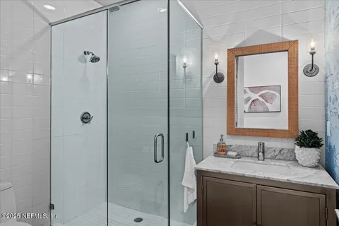 a view of a balcony with an ocean view