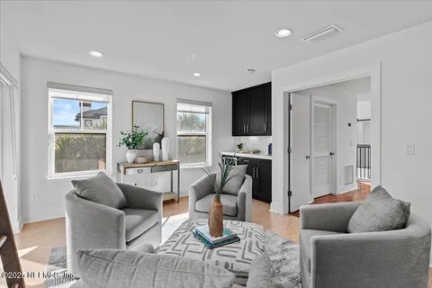 a kitchen with stainless steel appliances granite countertop a refrigerator and a stove