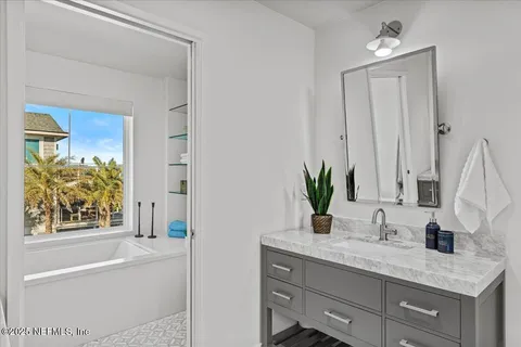 a view of a lake with a house in the background