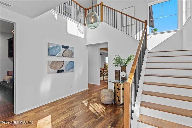 a view of entryway livingroom and hallway