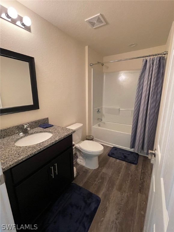 5010 Sun Court LaBelle, FL 33935 - Photo 18 of 20 a bathroom with a granite countertop sink toilet and shower