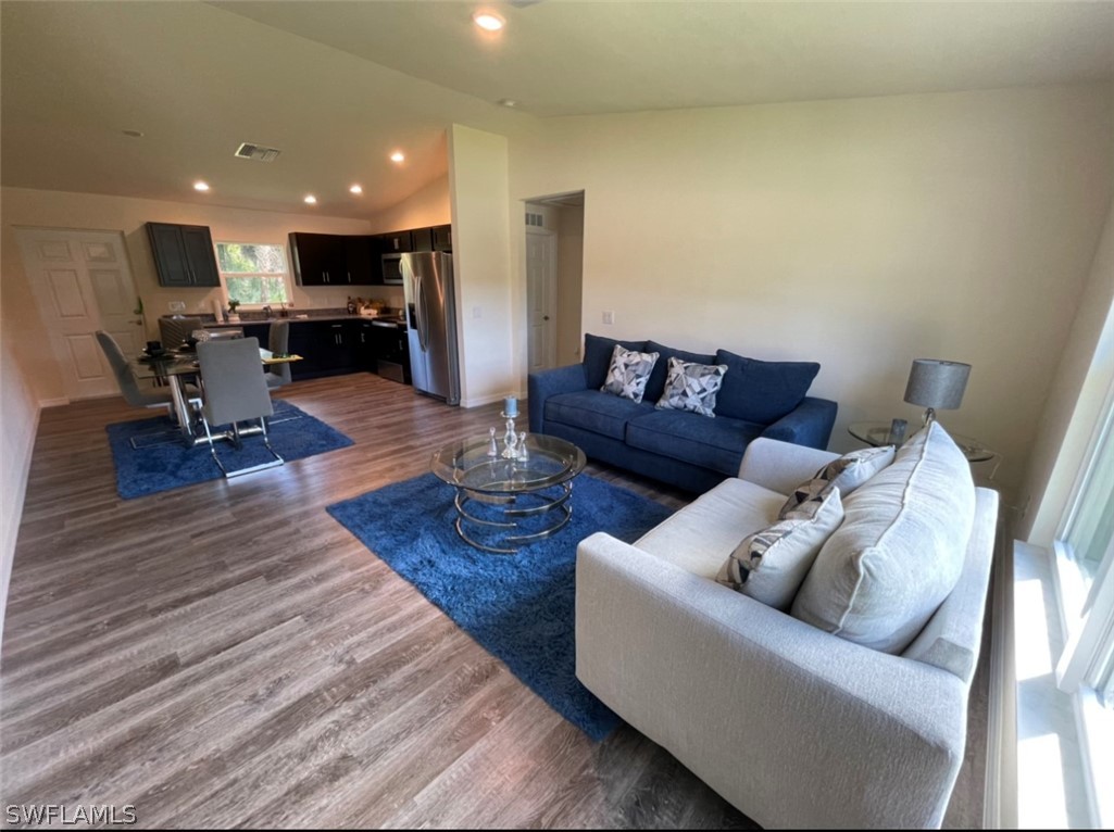 5010 Sun Court LaBelle, FL 33935 - Photo 5 of 20 a living room with furniture and wooden floor