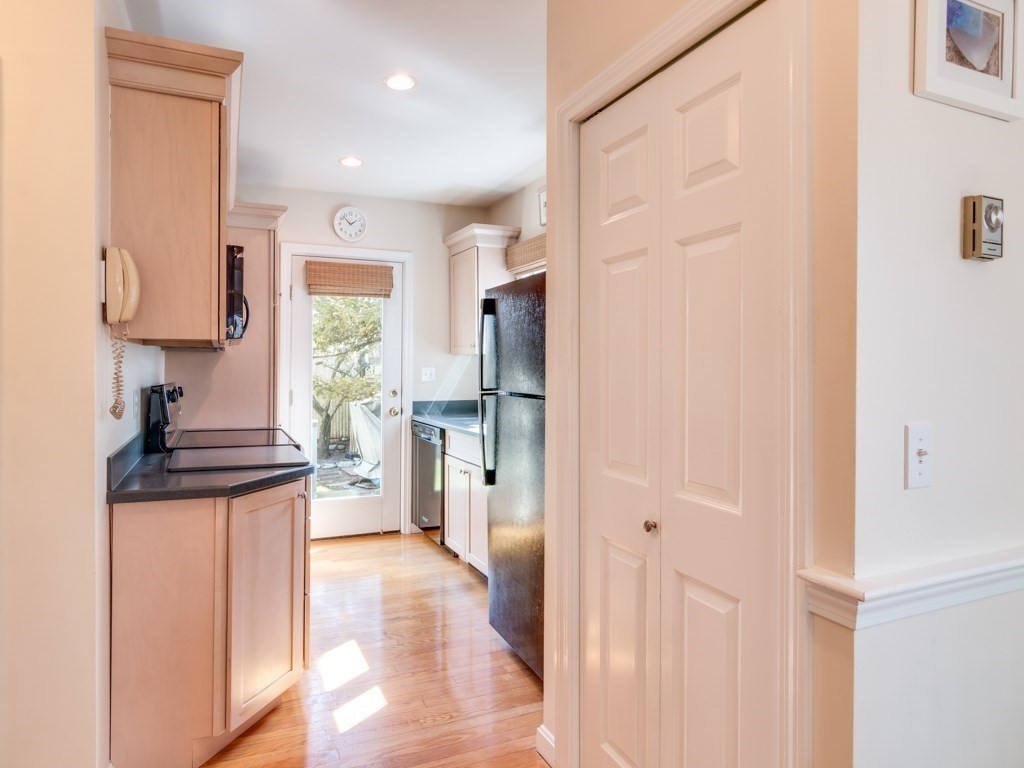 5 White Way Rockport, MA 01966 - Photo 12 of 41 a kitchen with stainless steel appliances granite countertop a refrigerator and a stove top oven