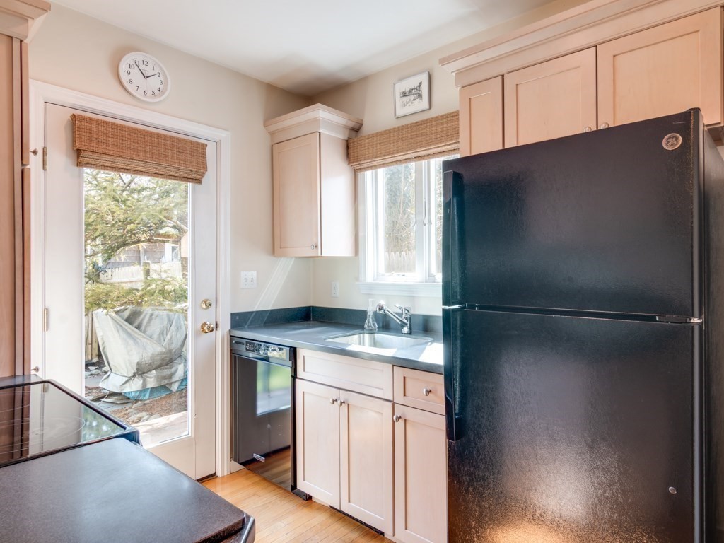 5 White Way Rockport, MA 01966 - Photo 13 of 41 a kitchen with a refrigerator a sink and a window