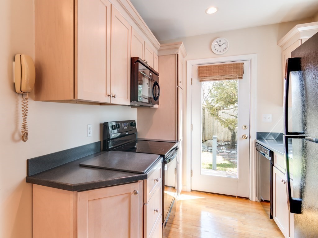 5 White Way Rockport, MA 01966 - Photo 14 of 41 a kitchen with stainless steel appliances granite countertop a sink stove and refrigerator