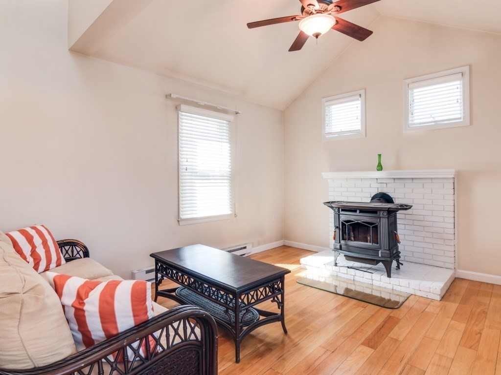 5 White Way Rockport, MA 01966 - Photo 7 of 41 a living room with furniture and a fireplace
