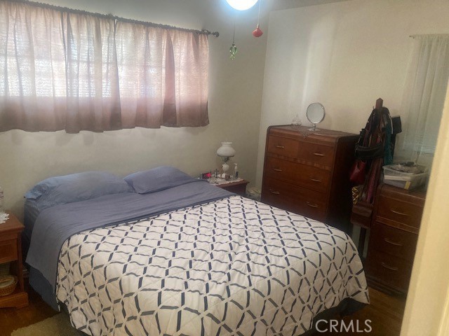 2701 Berkeley Street Bakersfield, CA 93305 - Photo 36 of 58 a bedroom with a bed and a window