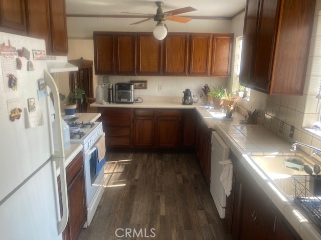 2701 Berkeley Street Bakersfield, CA 93305 - Photo 37 of 58 a kitchen with stainless steel appliances granite countertop a sink stove and refrigerator