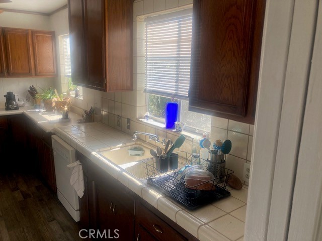 2701 Berkeley Street Bakersfield, CA 93305 - Photo 43 of 58 a bathroom with a sink and a mirror