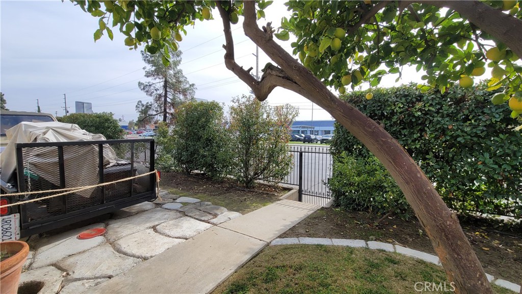 2701 Berkeley Street Bakersfield, CA 93305 - Photo 46 of 58 a backyard of a house with lots of green space