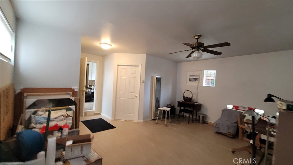 2701 Berkeley Street Bakersfield, CA 93305 - Photo 50 of 58 a bedroom with furniture and a window