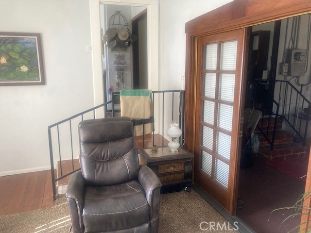 2701 Berkeley Street Bakersfield, CA 93305 - Photo 52 of 58 a view of a hallway with furniture and windows