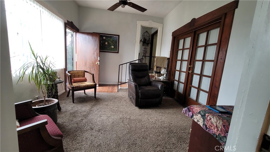 2701 Berkeley Street Bakersfield, CA 93305 - Photo 58 of 58 a living room with furniture and a flat screen tv
