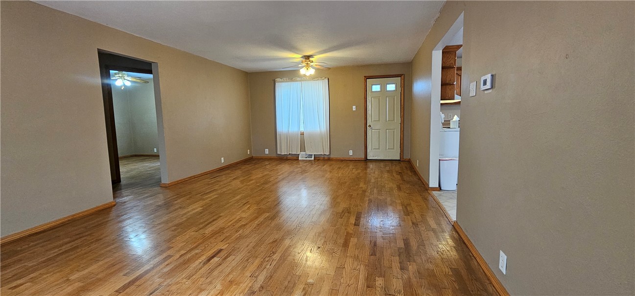 206 East Fifth Street St. Peter, IL 62880 - Photo 9 of 23 a view of hallway with wooden floor