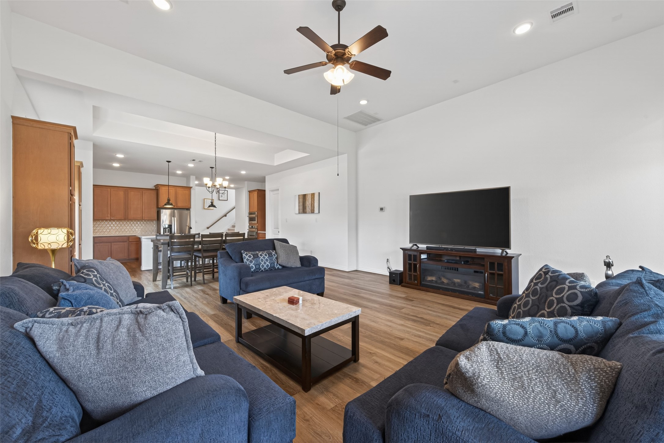 20802 Mirror Point Drive Cypress, TX 77433 - Photo 11 of 37 This expansive, open-concept living area offers views into a kitchen equipped with stainless steel appliances and the dining area. Great for effortless entertaining!