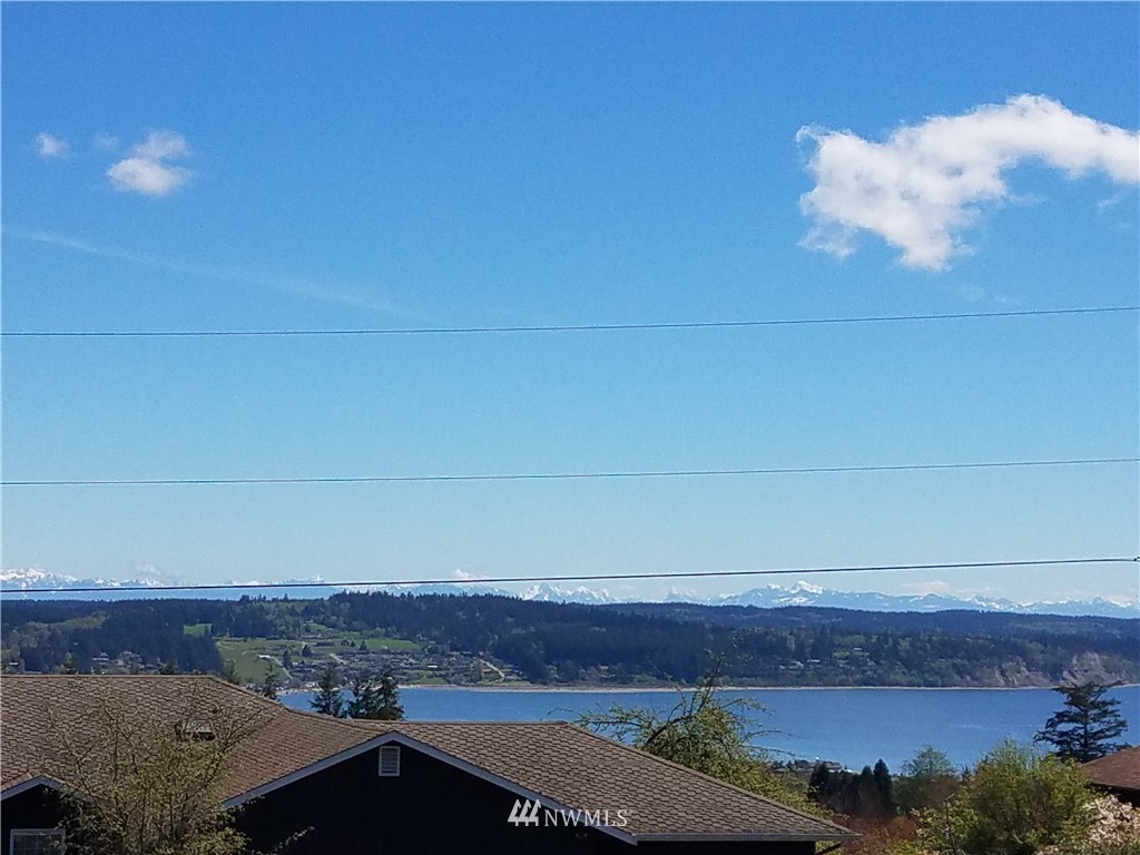 0 Lancaster Road Freeland, WA 98249 - Photo 5 of 11 a view of city and mountain