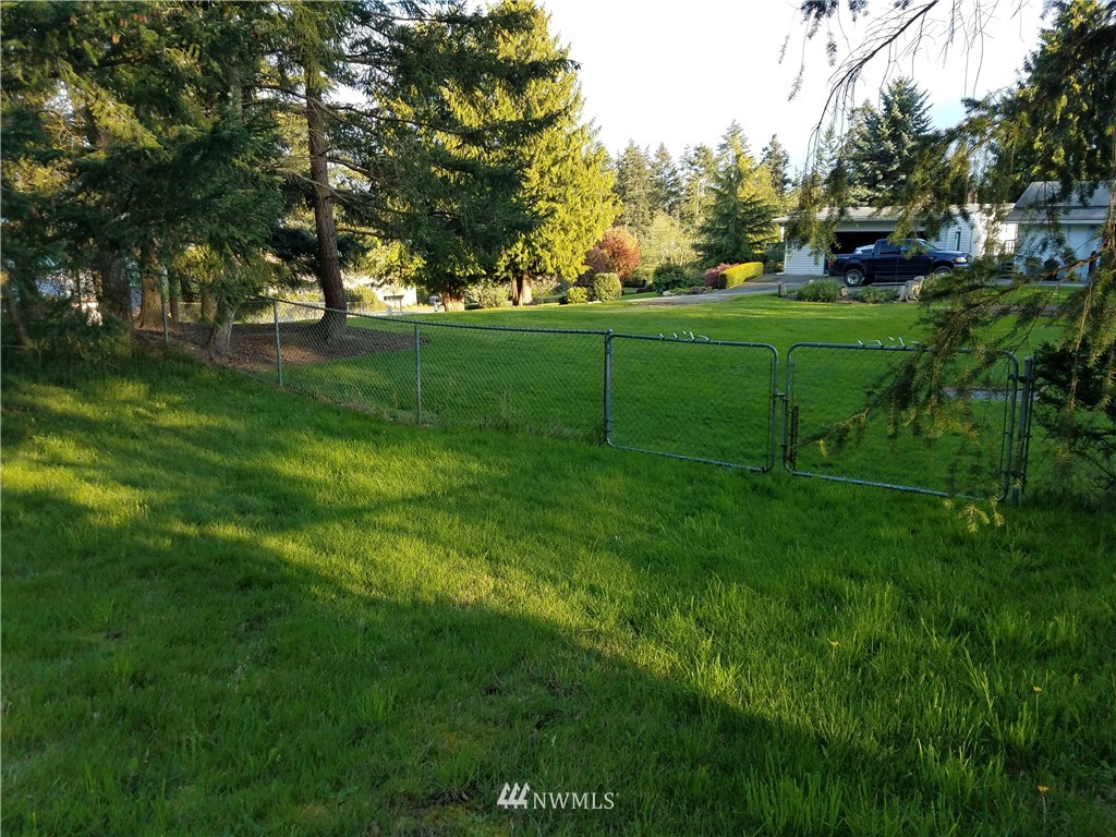 0 Lancaster Road Freeland, WA 98249 - Photo 9 of 11 a view of a park with large trees