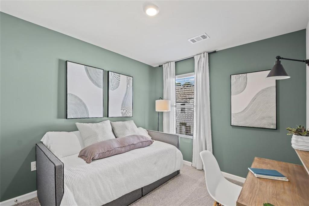 15 Silverbell Lane Rome, GA 30165 - Photo 17 of 26 a bedroom with a bed and a window