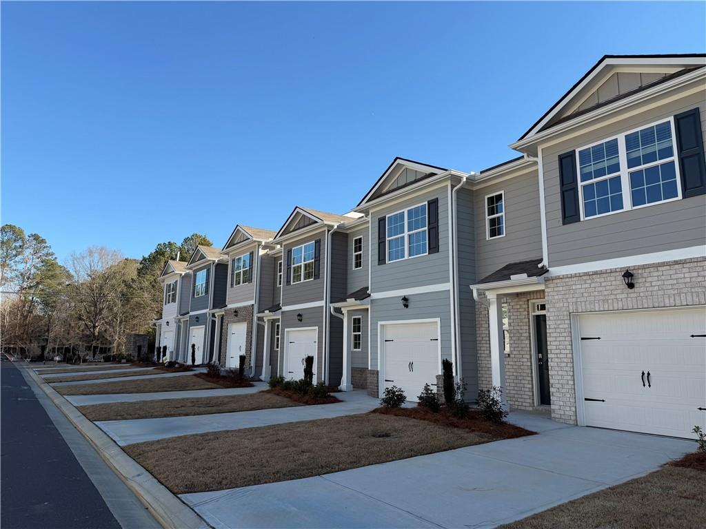 15 Silverbell Lane Rome, GA 30165 - Photo 22 of 26 a front view of a house with a yard