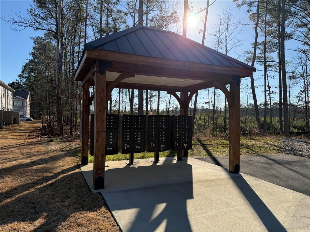 15 Silverbell Lane Rome, GA 30165 - Photo 24 of 26 a view of a patio with a table chairs and a backyard
